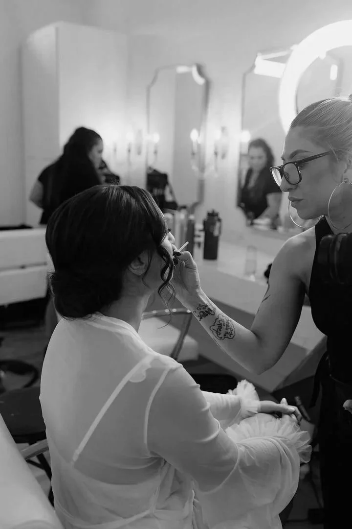 Andrea creating a bridal makeup look