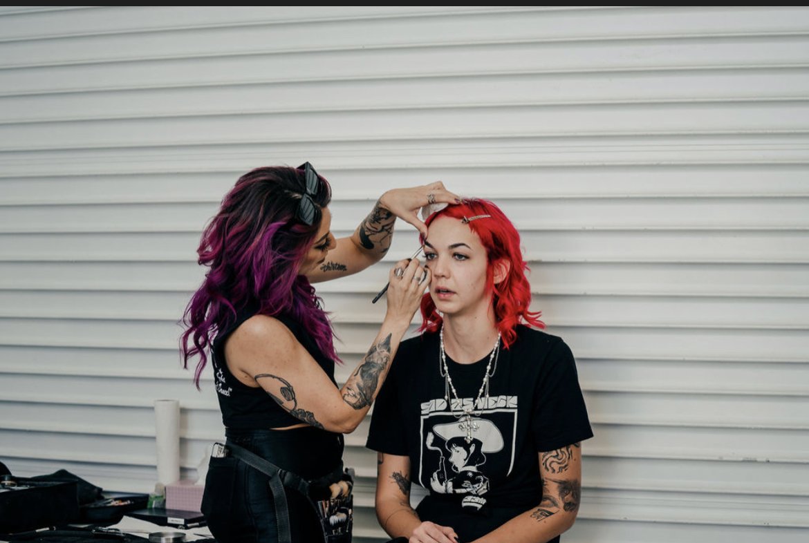 Andrea working on a makeup look